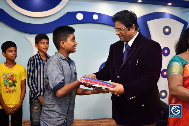 About Ten Poor and needy Students from Various Schools and Colleges of Mangalore brightened up as they received books, umbrellas and Education Scholarship from Grace Ministry on Sunday, June 16th, 2019. 